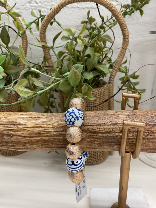 Gold Bead with Blue Flower Bead Bracelet